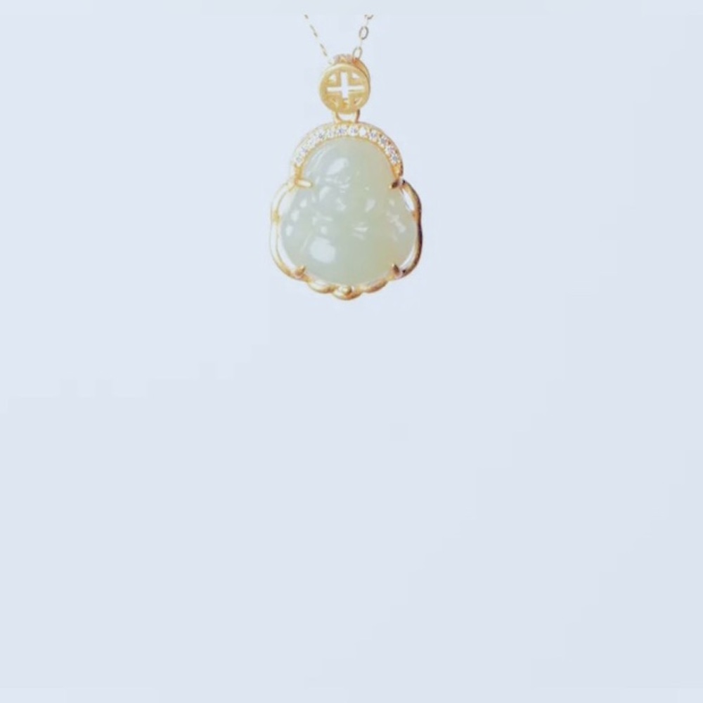 Jade Buddha pendant .924 sterling silver chain not included only the pendant